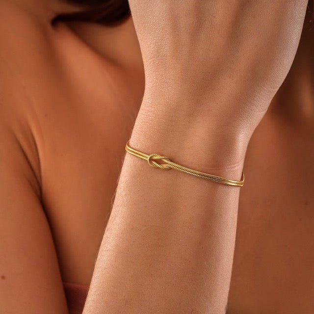 Amour | Minimalistische armband liefdesknoop-Armbanden-Calora-Goud-Calora
