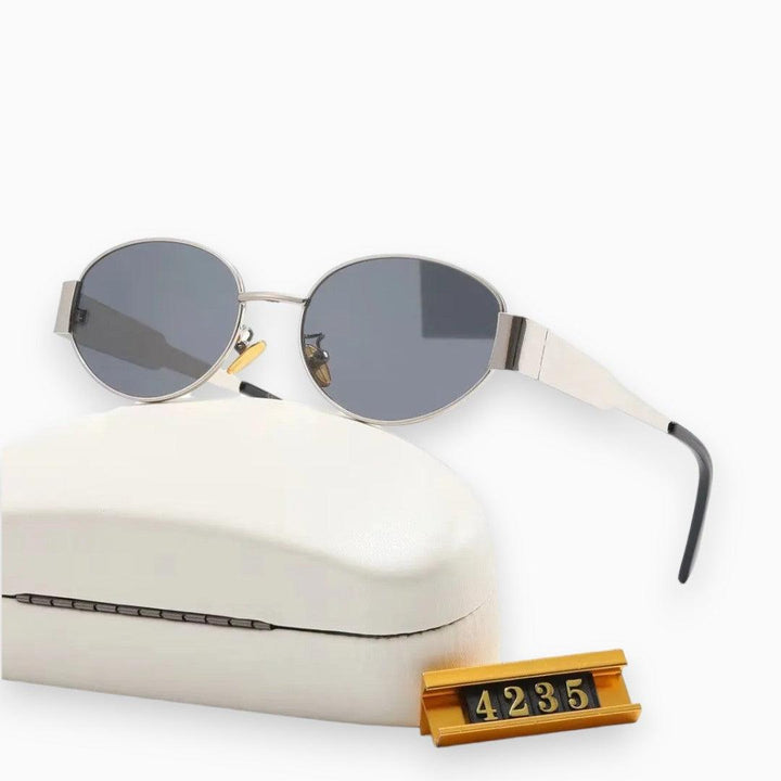 Elegante Ovale Cecilia Luxe Zonnebril in Zwart, Goud en Roségoud-Elektronica/Gadgets-Calora-Donkere glazen zilver-Calora