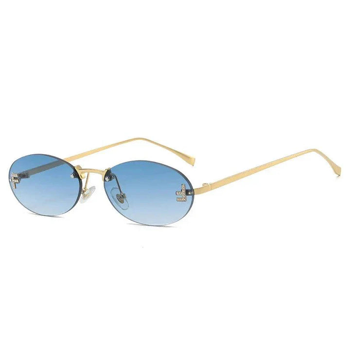 Elegante Ovale Zonnebril met Gouden Accenten en Subtiele Steentjes-Accessoires-Calora-Donkere glazen-Calora