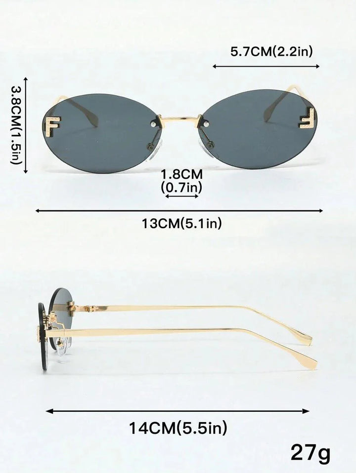 Elegante Ovale Zonnebril met Gouden Accenten en Subtiele Steentjes-Accessoires-Calora-Donkere glazen-Calora