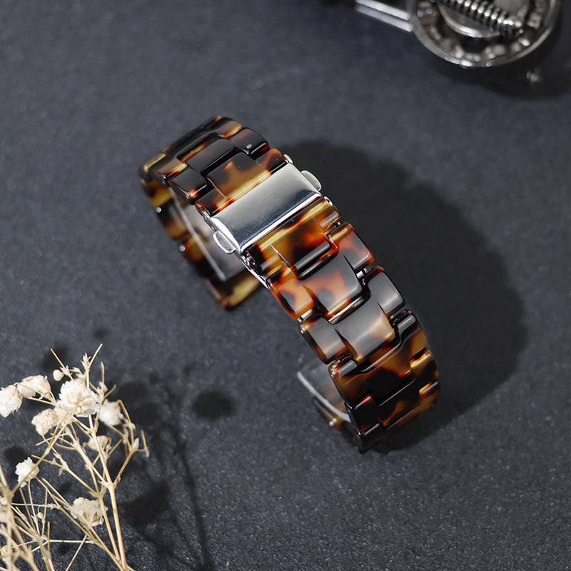 CALORA_ Hars Stalen Horlogeband voor Apple Watch 8e Generatie - in Schildpad, Parelwitte en Donkergroene Bloemen