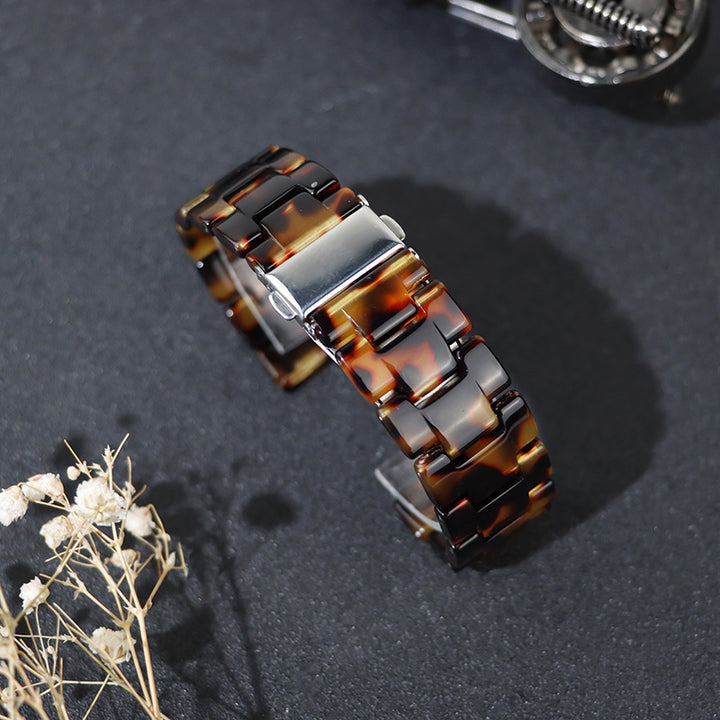 CALORA_ Hars Stalen Horlogeband voor Apple Watch 8e Generatie - in Schildpad, Parelwitte en Donkergroene Bloemen