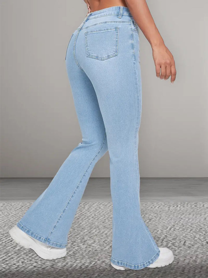 Kassia | Washed uitlopende Spijkerbroek met schuine zakken-Wijde Broeken-Calora-S-Calora
