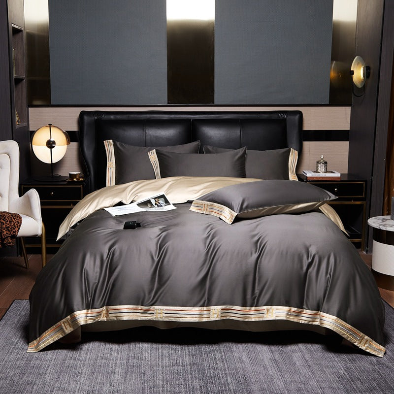 CALORA_ Luxe Geborduurd Satijnen Katoen Beddengoed Set - 4-delig - Comfortabel en Ademend