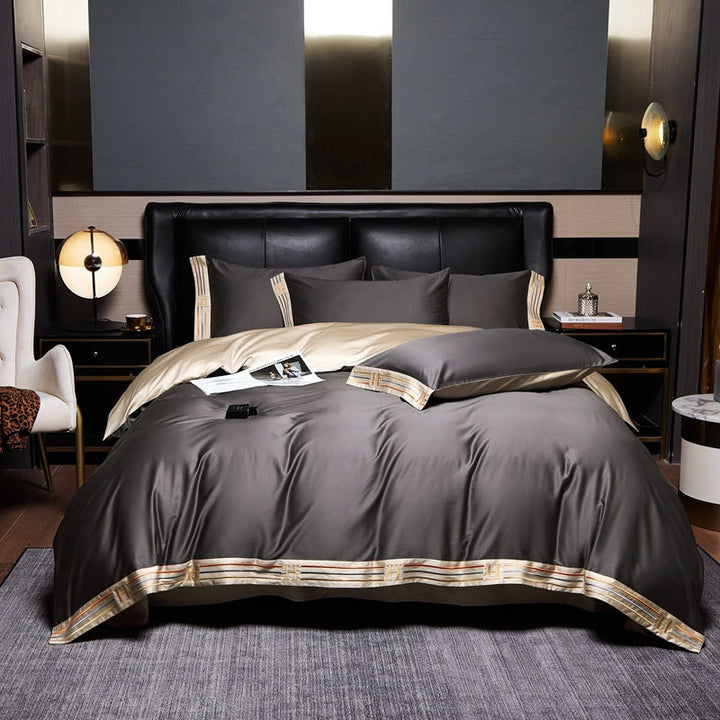 CALORA_ Luxe Geborduurd Satijnen Katoen Beddengoed Set - 4-delig - Comfortabel en Ademend