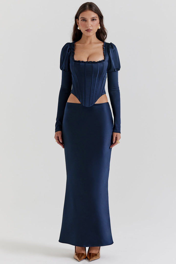 CALORA_ Marineblauw korset met pofmouwen en satijnen maxirok met schuine snit