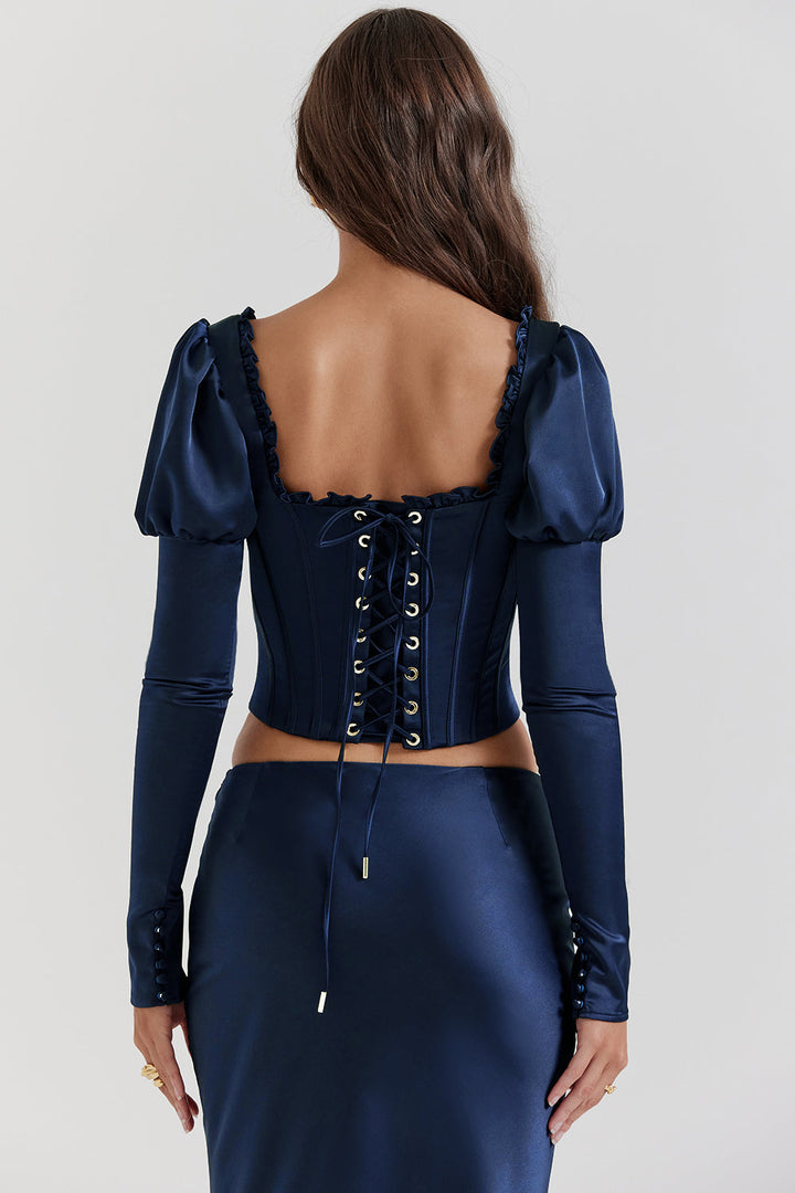 CALORA_ Marineblauw korset met pofmouwen en satijnen maxirok met schuine snit