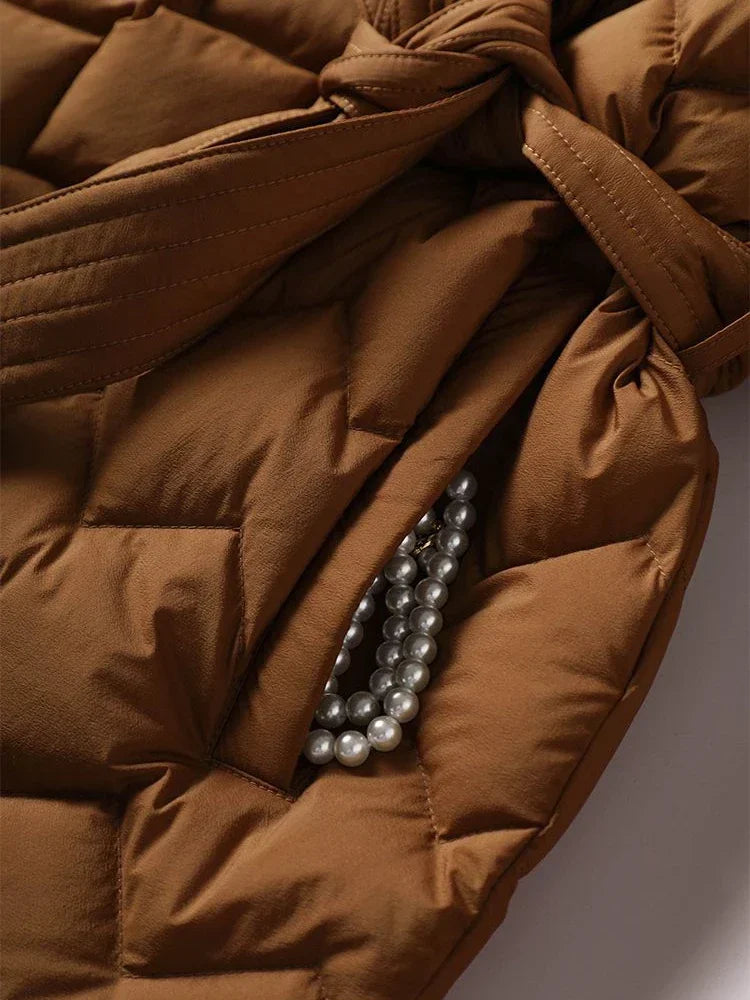 Melania | Gewatteerde winterjas voor dames met strikceintuur-Zomer Jassen-Calora-Karamel-S-Calora