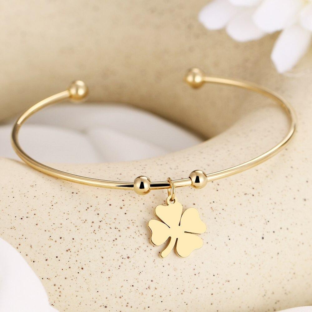 Omnia | Vierbladige Klaver Open Armband - Geluksarmband-Armbanden-Calora-Zilver-Calora