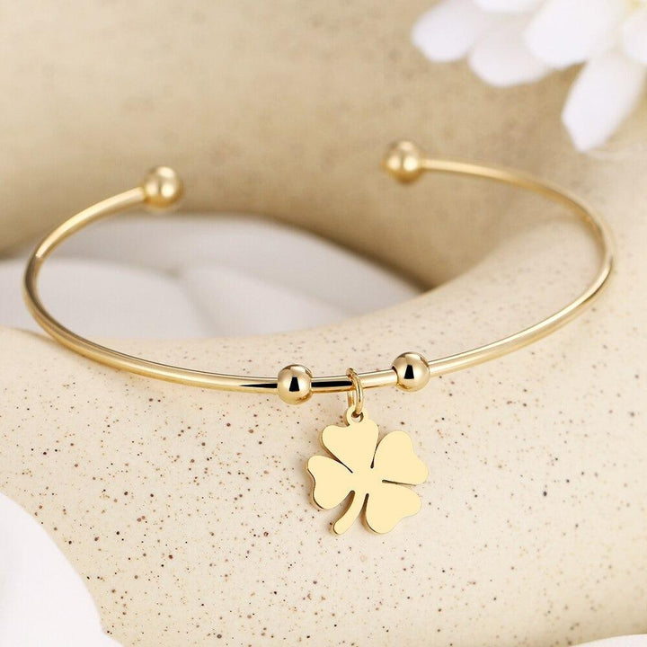 Omnia | Vierbladige Klaver Open Armband - Geluksarmband-Armbanden-Calora-Zilver-Calora