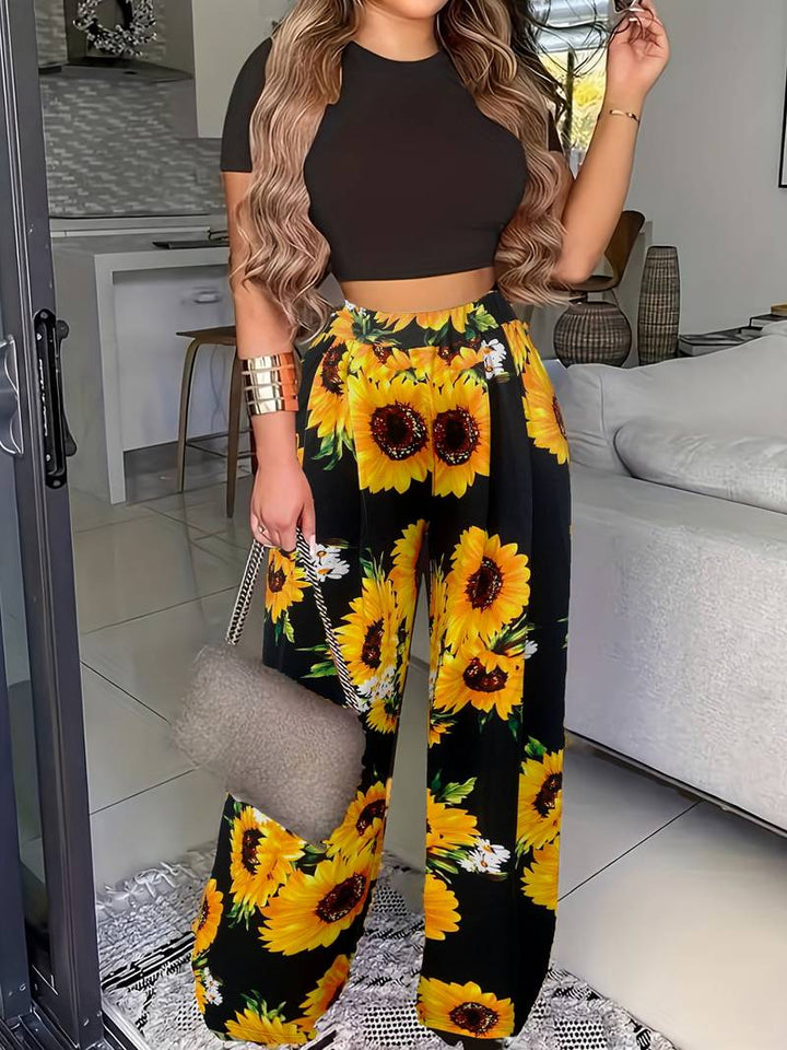 Rosie | Tweedelige set met top en gebloemde broek-Sets & Pakken-Calora-Zwart/Geel-XS-Calora