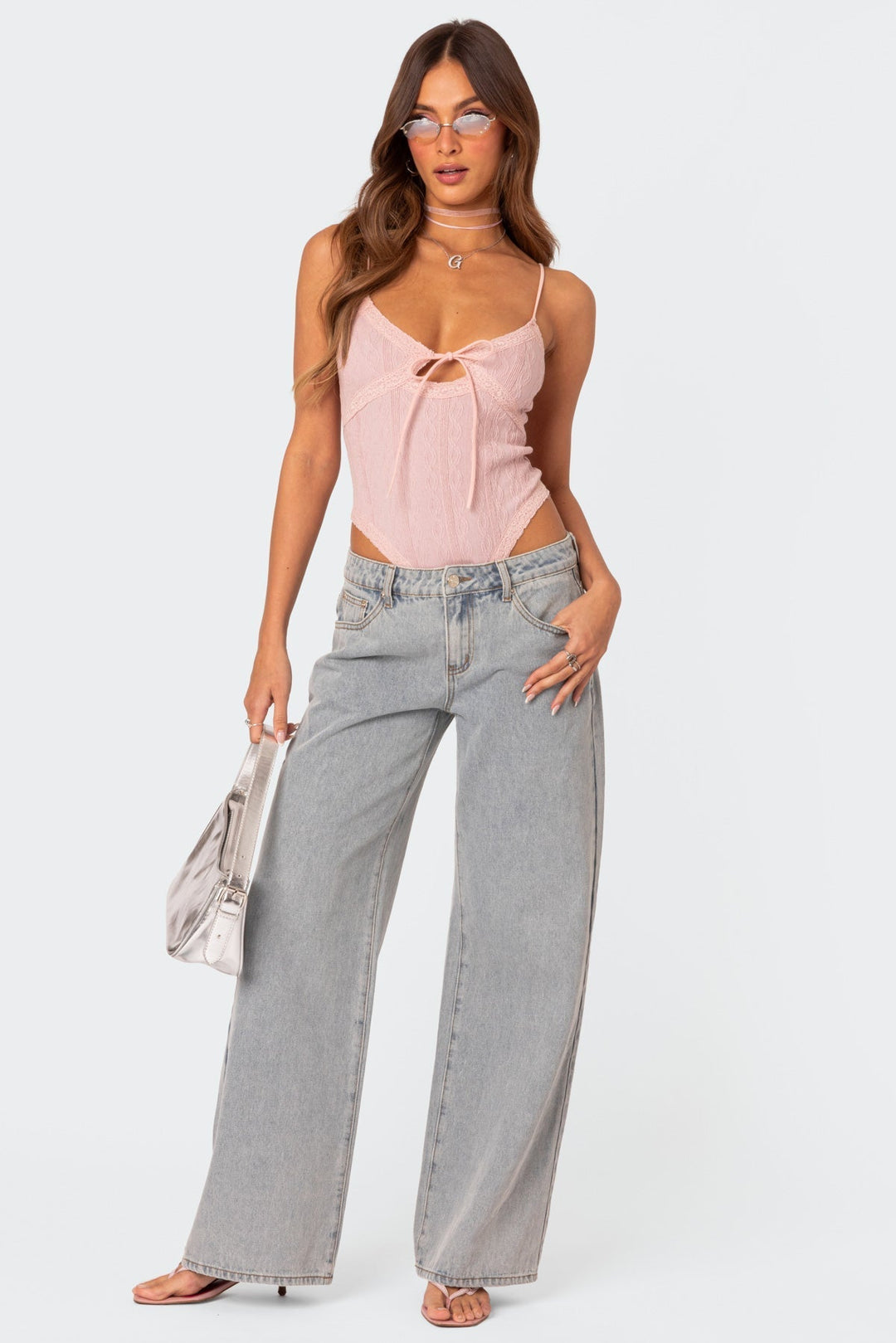 CALORA_ Speelse Bow Tie Jeans met Boordetail en Elegante Achterzak