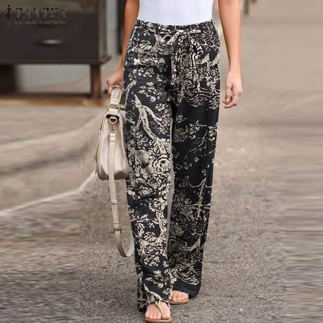 Zomerse bloemenprint broek met strik-Wijde Broeken-Calora-Zwart-XS-Calora