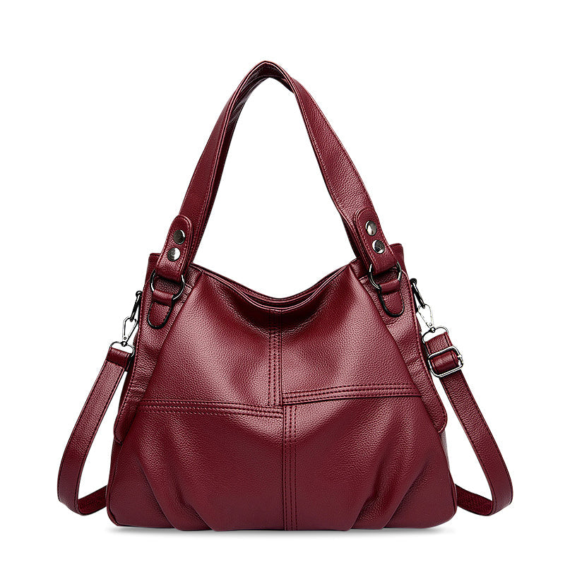 CALORA_ Zwarte Vegan Leren Handtas met Schouderriem en Stijlvol Design